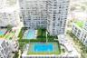 High-rise residential building featuring a blue-surfaced tennis court, swimming pool, landscaped lawn, and multiple levels of private balconies