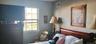 Multi-pane window featuring grid detailing and neutral-toned wall paint