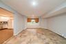 This room can be used as an additional bedroom w/closet or dining room for lower level