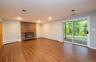 Lower Level Living Room with sliding glass doors leading out to patio