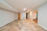 This room can be used as an additional bedroom w/closet or dining room for lower level