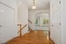 Hallway with coat closet