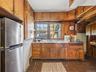 Original kitchen. Needs updating.