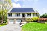 Contemporary cape with vinyl and stone front