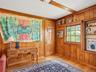Bedroom with hardwood floors and walk-in closet