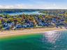 Aerial view of private beach and proximity to the water.