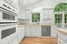 Gas wall oven and built-in microwave.