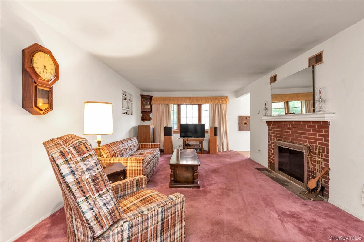 Living Room With Wood Burning Fireplace