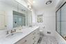 Hall bathroom with bathtub and shower