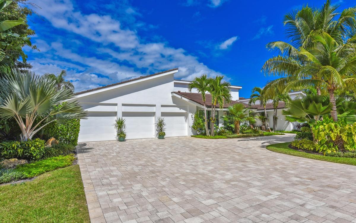 Large 3 car garage plus golf cart garage