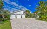 Large 3 car garage plus golf cart garage
