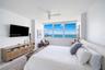 Large primary bedroom with 2 closets and ensuite