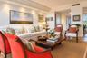 Recessed ceiling lighting, crown molding, and wood-finish flooring