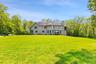 Back of property featuring 3.47 level acres