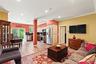 Accessory apartment living area featuring light wood-style flooring, recessed lighting, and ornamental molding