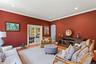 Living area with baseboards, wood finished floors, crown molding, french doors, and recessed lighting