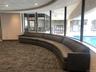 Lounge area overlooking pool in Swim & Fitness center.