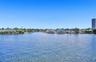 Waterfront parcel featuring extensive canal frontage, deep-water access, and tropical landscape
