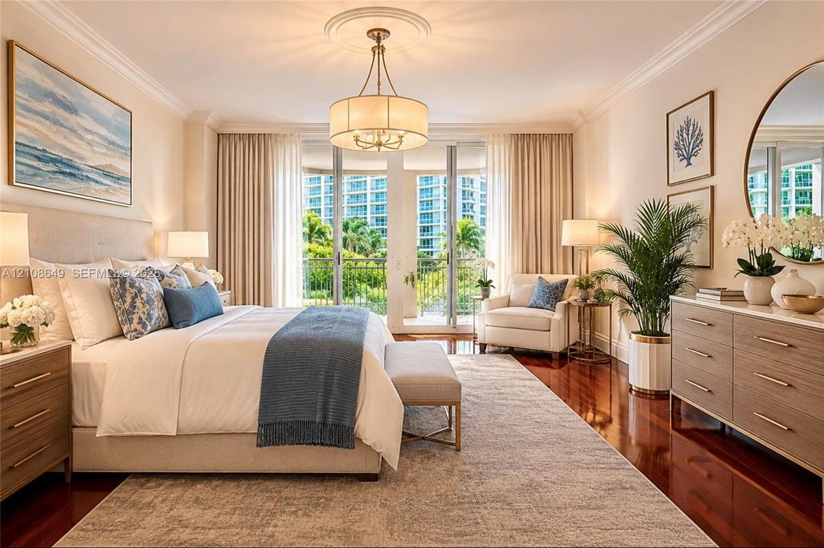Hardwood flooring, crown molding, ceiling medallion, drum pendant light fixture, and floor-to-ceiling glass panel doors