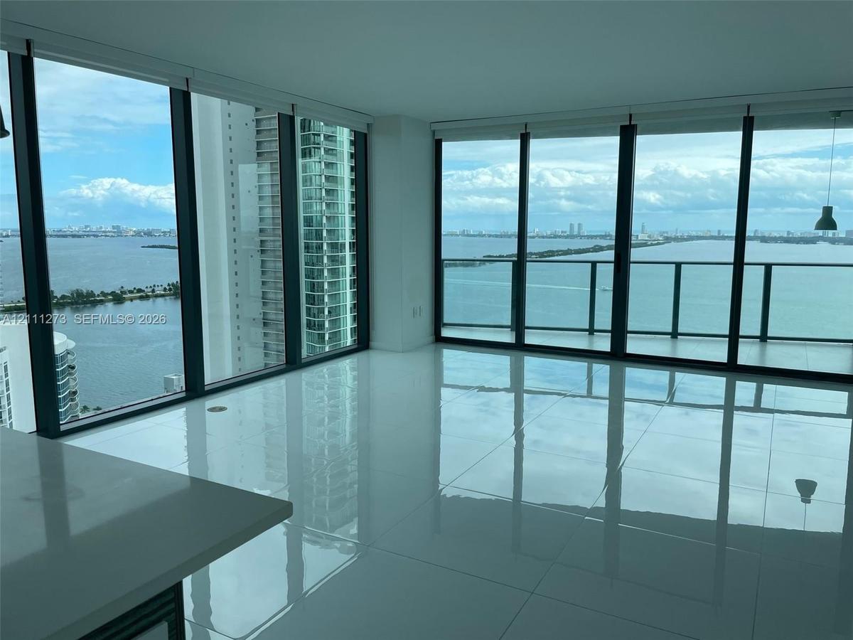 Full glass living room area with spectacular view!