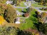 View of the detatched 2 car garage and the Park-like property!