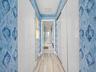 Closet hall to additional bedroom