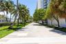 Walk-way right behind the building. 24th Street to the South to 29th Street to the North.