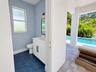 Powder bath, access from pool deck and the kitchen