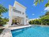 Heated saltwater pool, with a covered patio and outdoor kitchen