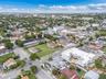 Aerial perspective featuring corner lot positioning and proximity to established residential infrastructure