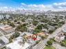 Aerial perspective featuring a corner lot orientation and proximity to the metropolitan skyline