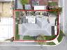 Aerial perspective of a corner lot property featuring a shingle roof, a concrete driveway, and an enclosed rear yard
