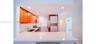 Kitchen featuring wood cabinetry, white solid-surface countertops, recessed lighting, and stainless steel appliances