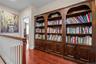 Looking toward the primary bedroom, this hallway recess easily serves as a library.