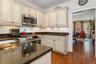The fine appliances in this all-Bosch kitchen, generous counters, and plentiful storage within reach all combine to support your culinary efforts.