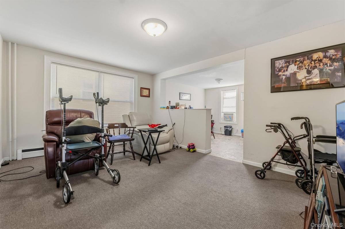 First of all, floor, living room, Looking into beautiful Open space kitchen