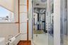 The shower enclosure features a built-in sauna function