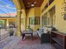 Outdoor covered lanai overlooking the pool to enjoy your Florida lifestyle! Complete privacy from any neighbors!
