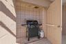 grill storage with double doors.