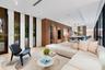 Open-concept space featuring wood-finish flooring, floor-to-ceiling windows, recessed lighting, and full-height wood cabinetry with built-in wall oven
