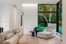 Floor-to-ceiling windows with dark framing, wood-finish flooring, recessed lighting, and minimalist interior architectural design