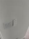 Wall-mounted remote control unit and dual rocker light switch