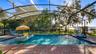 2 sets of sliders from great room to rear covered porch/pool added in 2023
