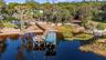 Aerial from lake Minnehaha of 1730 Nita Place Clermont, FLResurfaced Seawall in 2026, Renovated Dock platform 10/2022, Renovated Dock walkway 5/2026