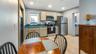 Detached garage and apartment. 2 car parking plus storage. Driveway off Lakeshore drive, little fenced in back yard. Full kitchen, laundry closet. rem