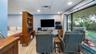 Detached garage and apartment. 2 car parking plus storage. Driveway off Lakeshore drive, little fenced in back yard. Full kitchen, laundry closet. rem