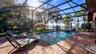 2 sets of sliders from great room to rear covered porch/pool added in late 2022