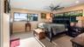Primary with private bath and amazing lakefront views