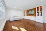 Second Floor - Living Room #2, Refreshed wood floors, Built in cabinets.