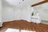 1st Fl Dining area, facing door to Primary Bedroom. Warm wood floors